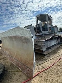Sandblasting a steel panel to bare metal