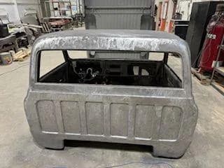 Blasted truck cab ready for coating