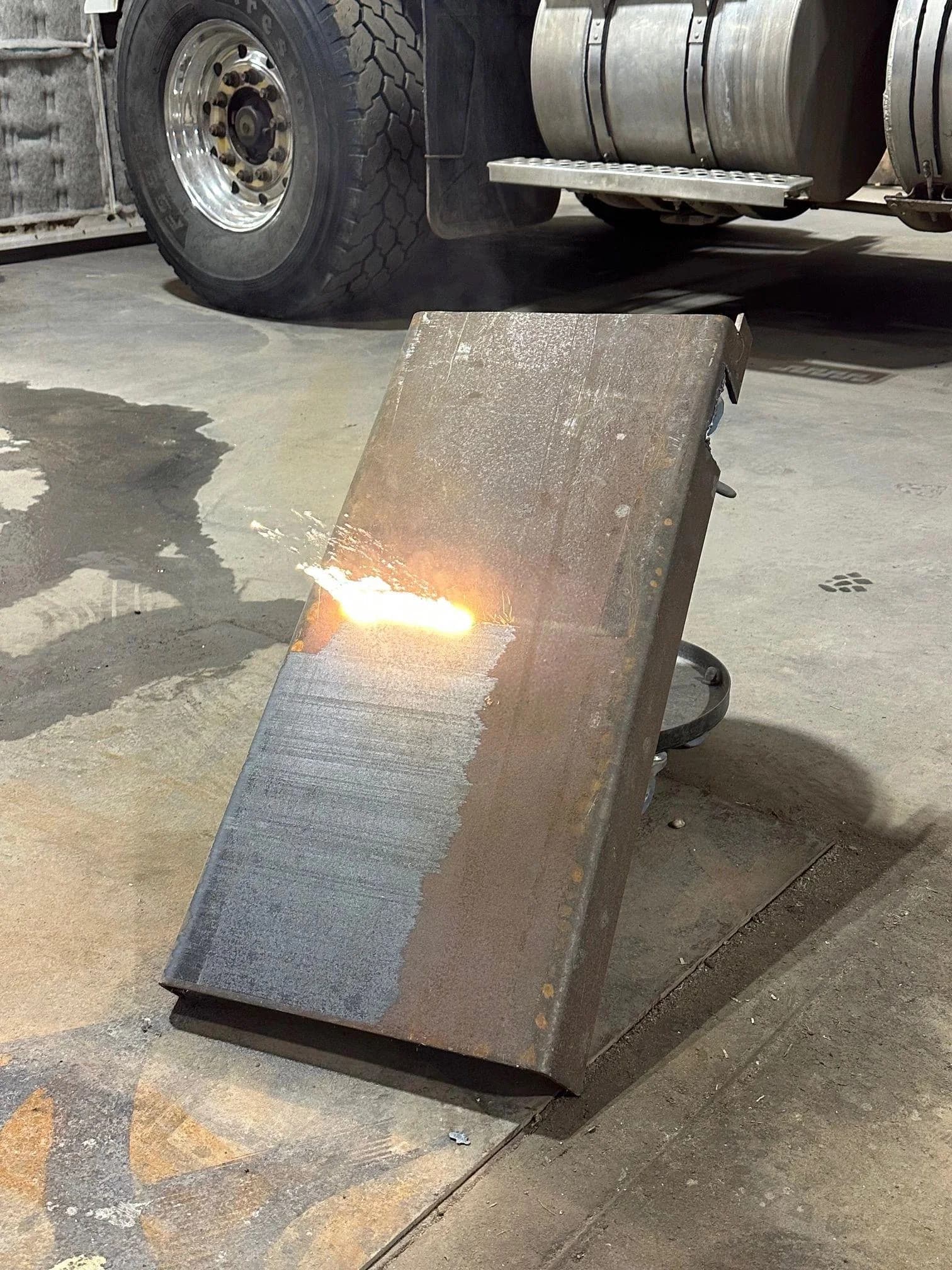 Laser cleaning a steel plate down to bare metal