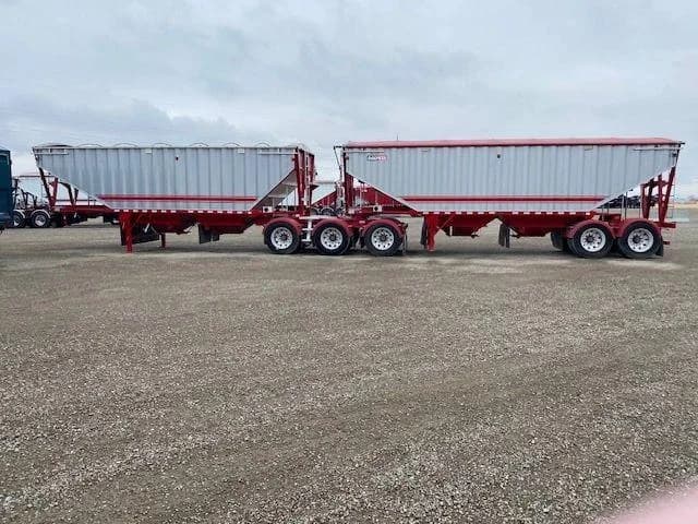 Grain trailers lined up on the lot